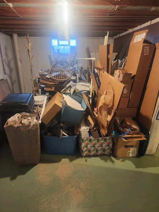 Roll-off dumpster container at job site for 20 Yard Dumpster Rental in Pine Hills